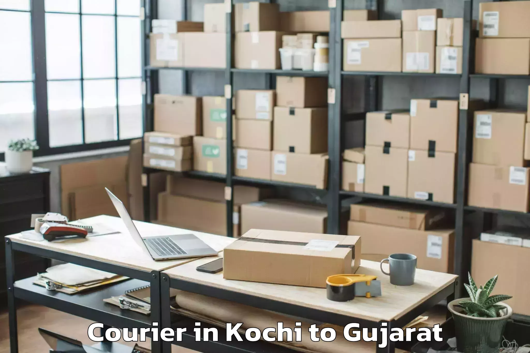 Easy Kochi to Crystal Mall Rajkot Courier Booking